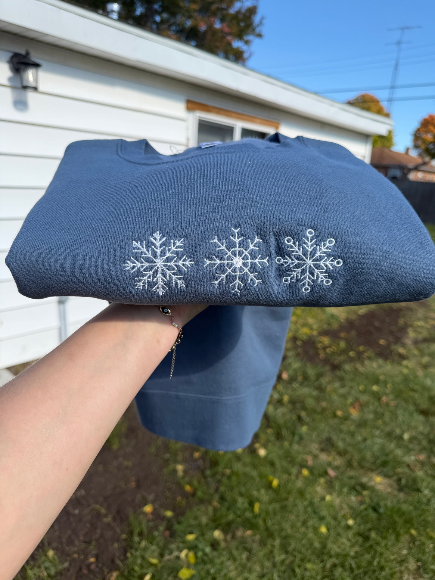 Snowflake trio embroidered crewneck