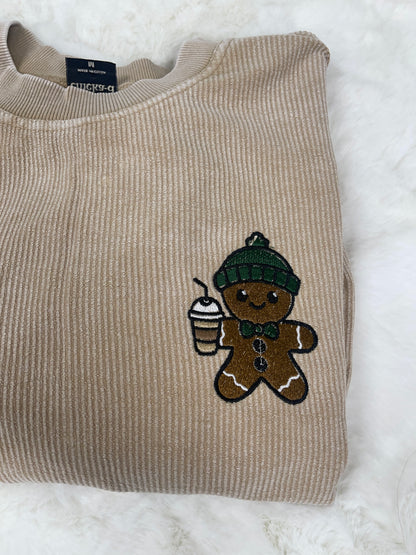 Waffle gingerbread man with iced coffee