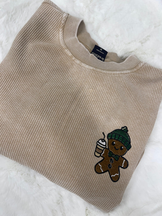 Waffle gingerbread man with iced coffee