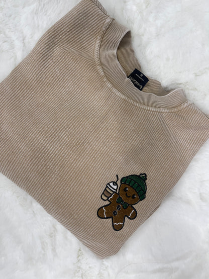 Waffle gingerbread man with iced coffee