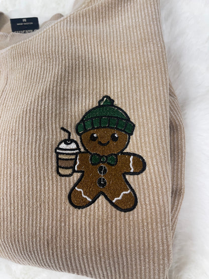 Waffle gingerbread man with iced coffee